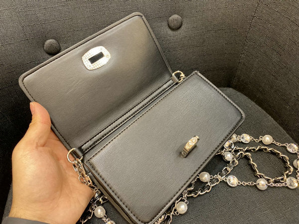 Mi*m*u Crystal nappa leather and crystal mini-bag